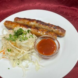 Колбаски на гриле свиные